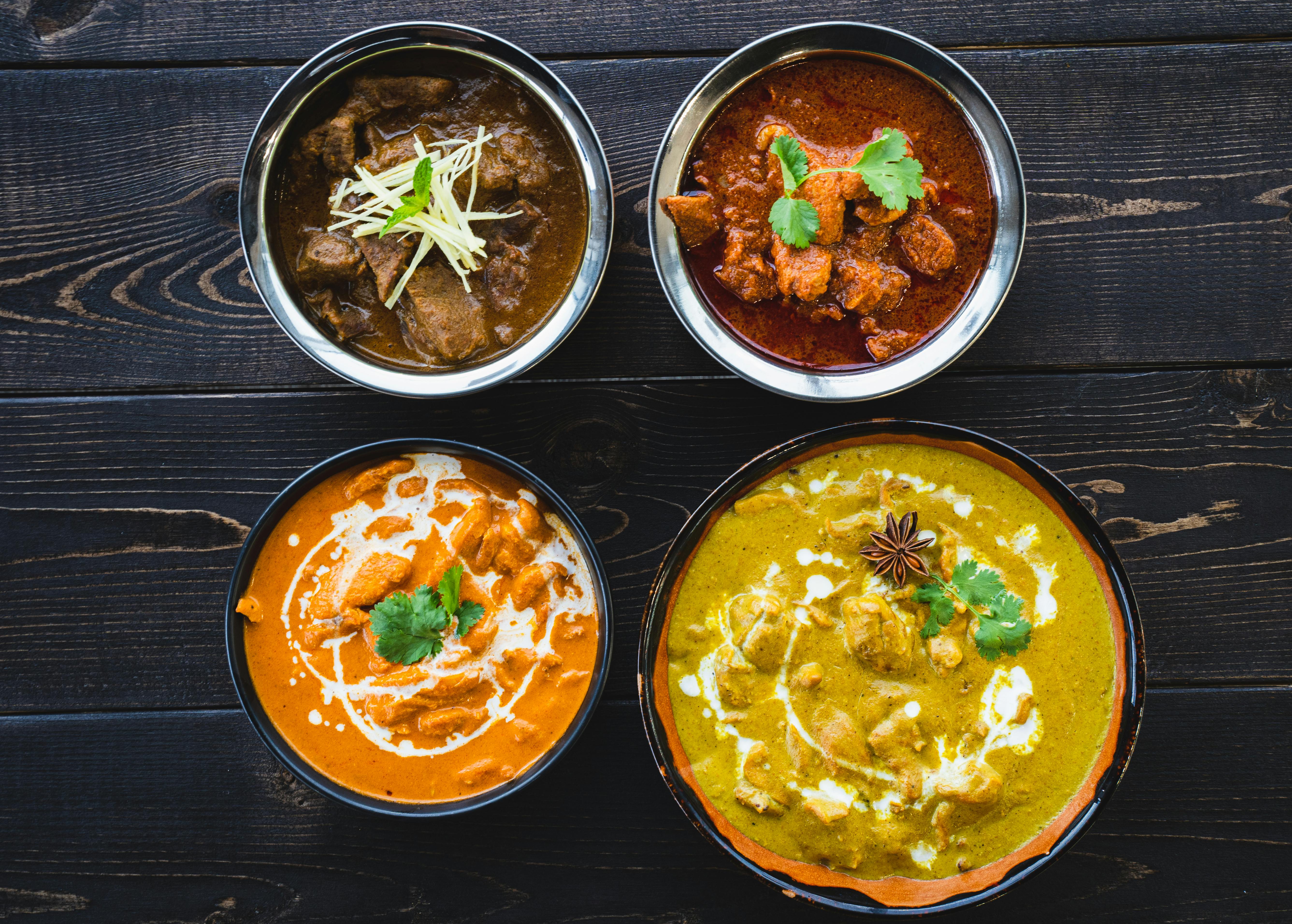 Best Indian restaurant Edmonton - New Mountain Village at 248 91 St SW serving authentic Butter Chicken and Momos