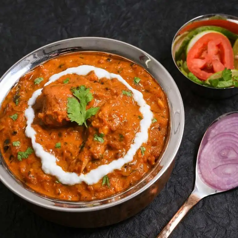Butter Chicken - Creamy and flavorful curry at New Mountain Village Edmonton Indian restaurant